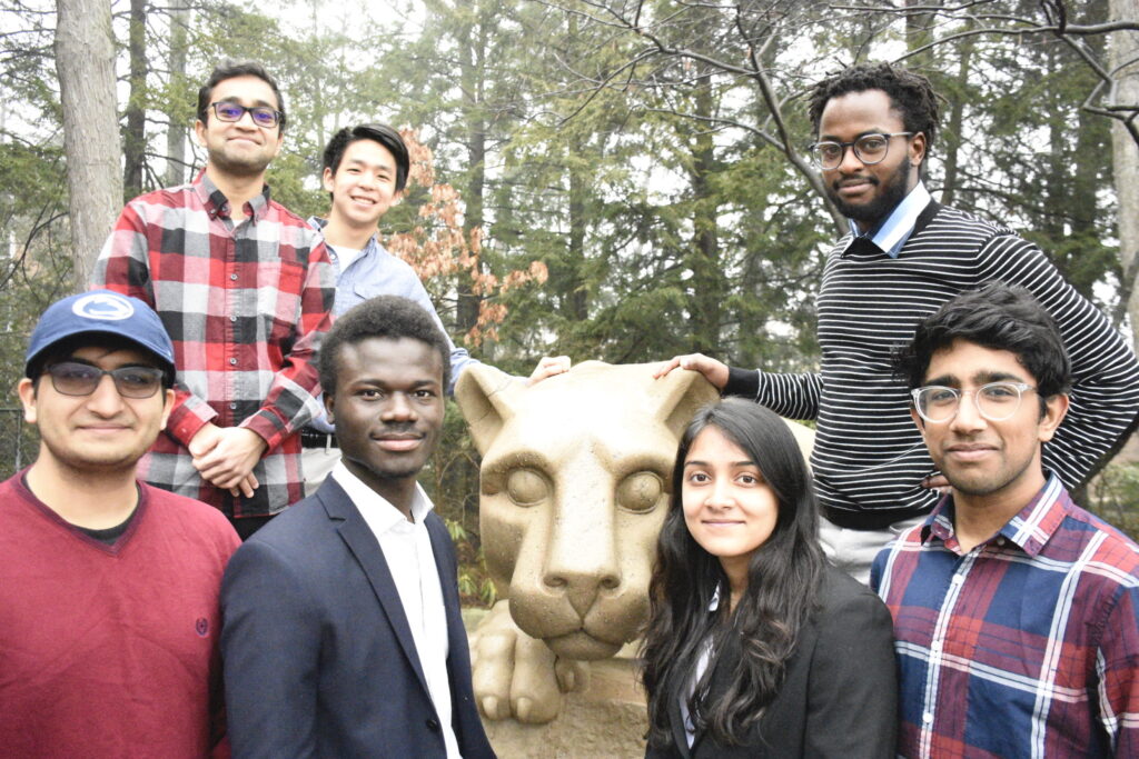 Nittany AI Challenge team members pose with the Nittany Lion Shrine